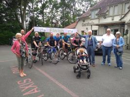 Bury Rotary supporters being welcomed home after their fund raising ride across Greater Manchester